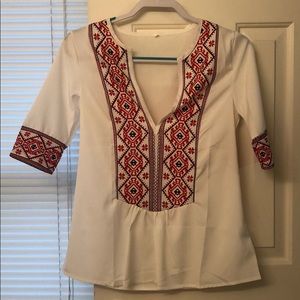 White patterned deep v-neck